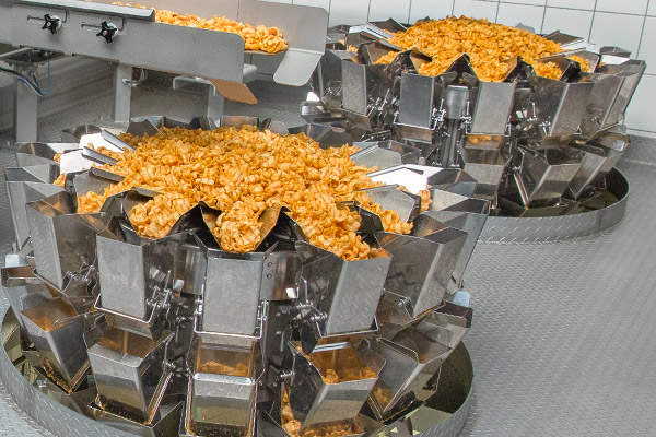 Industrial weighing systems for snack foods